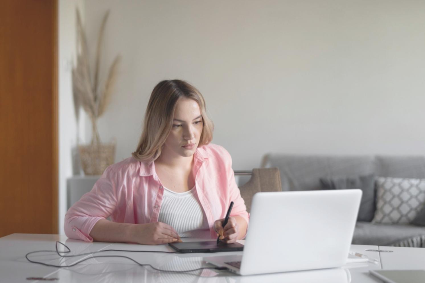 Person reviewing financial statements and income documentation